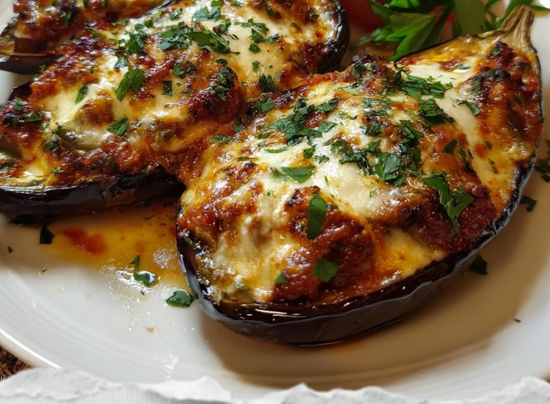 Papoutsakia (Greek Stuffed Eggplant with Seasoned Beef, Creamy Béchamel, and Golden Cheese)